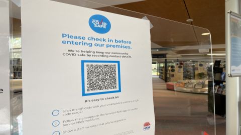 QR Code sign at library entrance