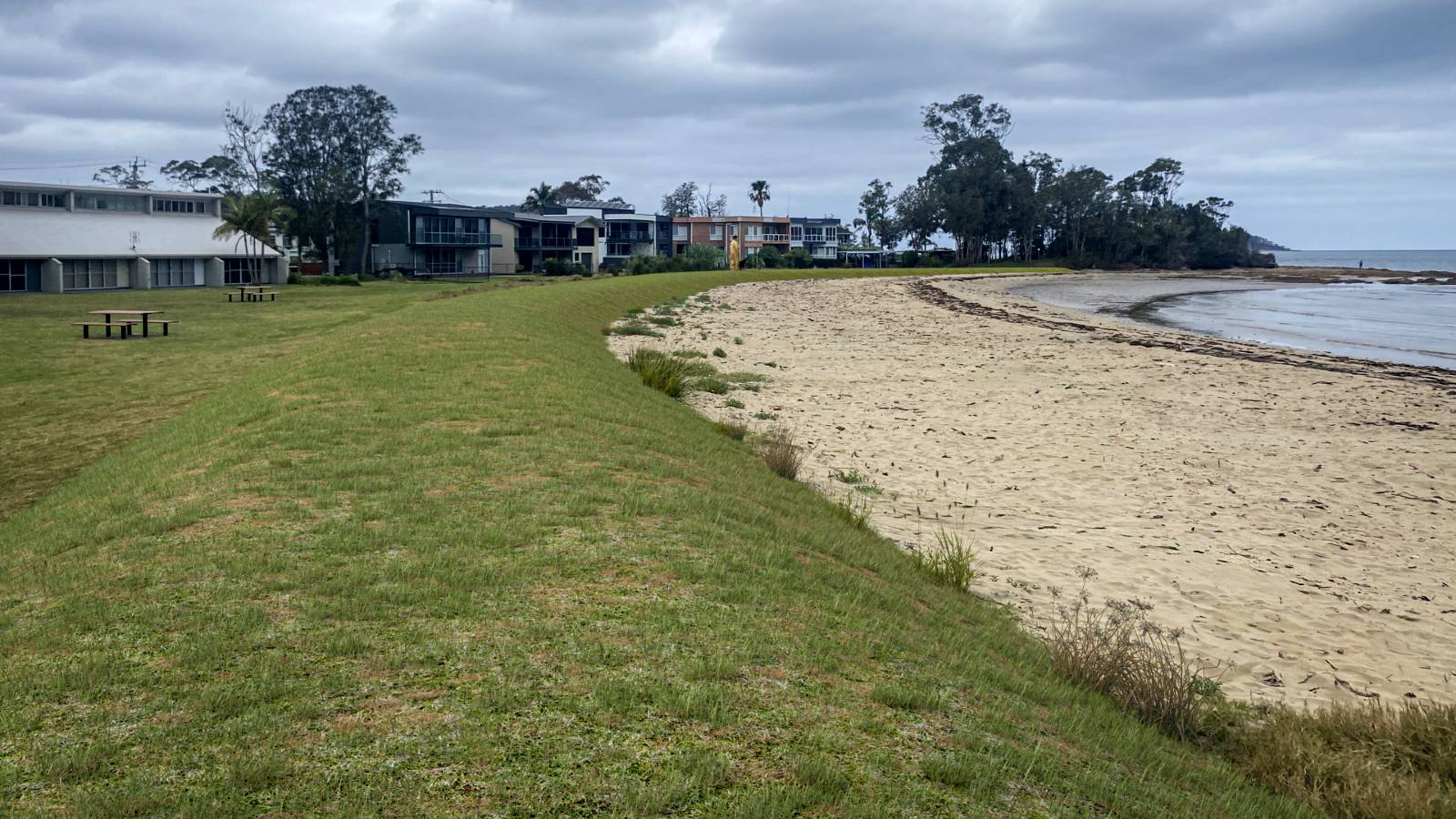 A raised grass embankment has been photoshopped into an image of the coastline