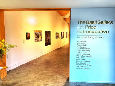 Sign of past winners and view in to Basil Sellers Art Prize retrospective