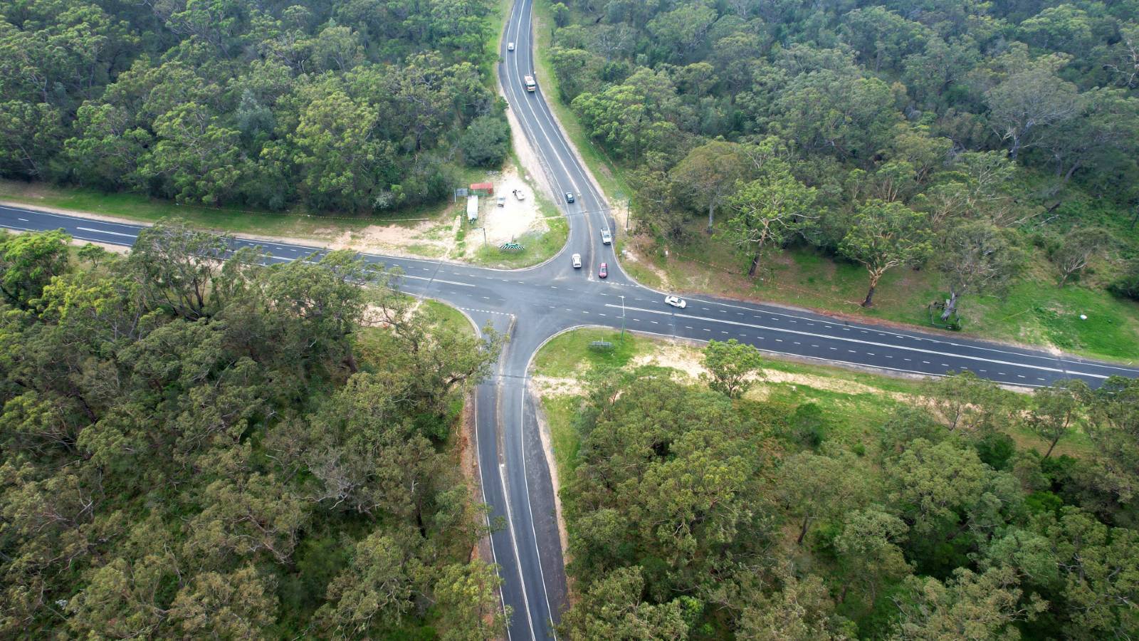 Image An aerial image shows crossroads in a bushland setting.