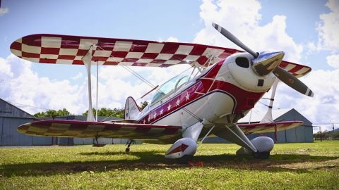 Old fashioned red and white plane